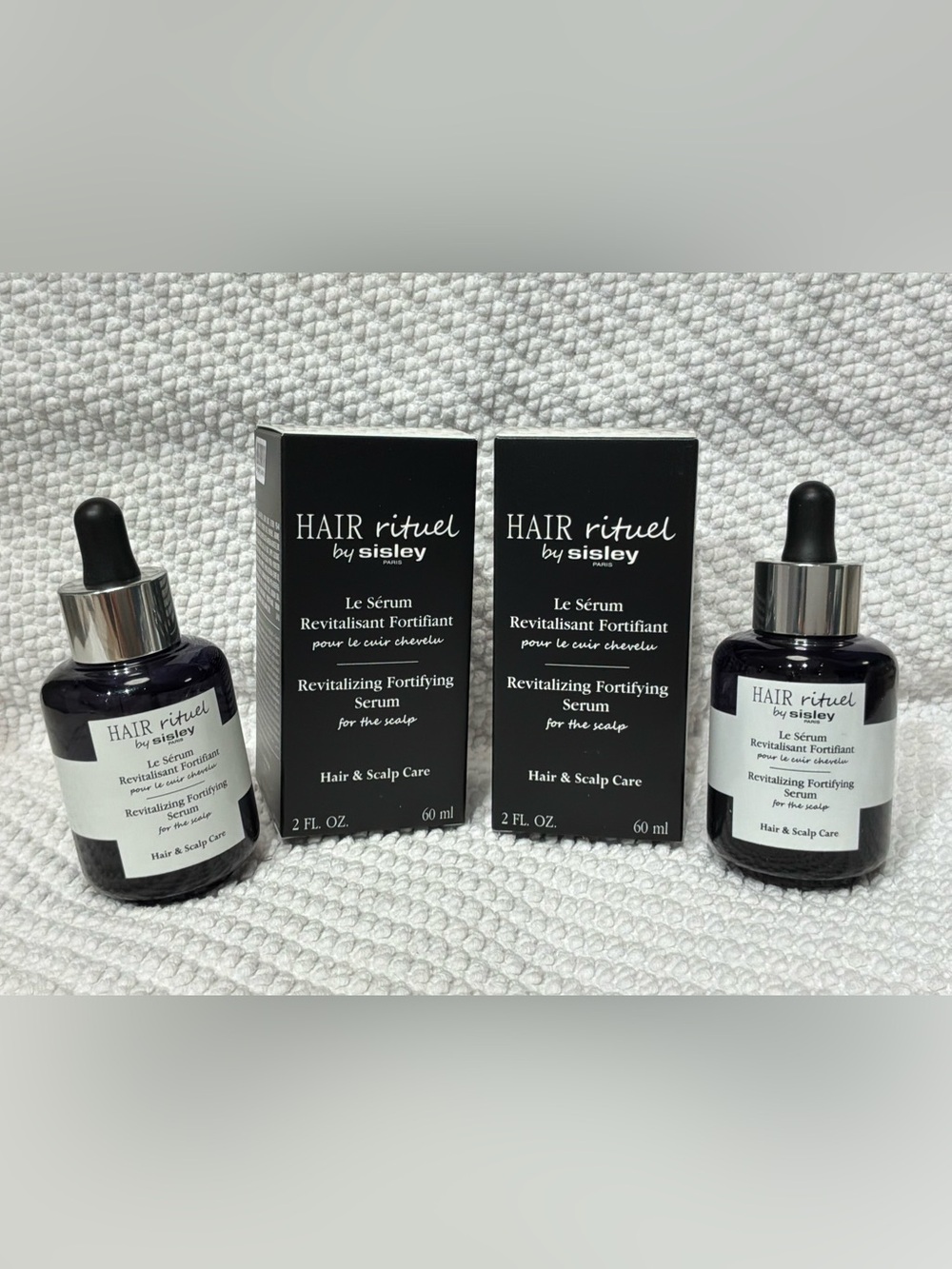 Sisley Revitalizing Fortifying Serum 60ml $150 each.